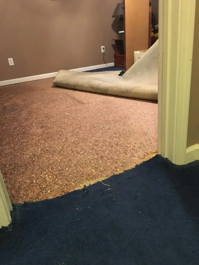 Carpet pad removal revealing water damage during Drying & Dehumidification in Ephrata